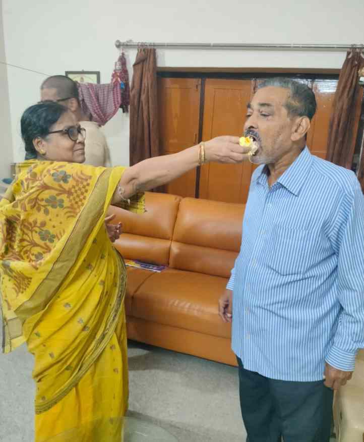 With his wife